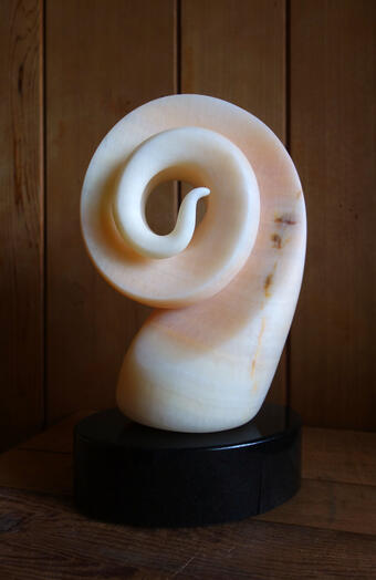 Dangerous Game - Peach onyx on granite base - 2025